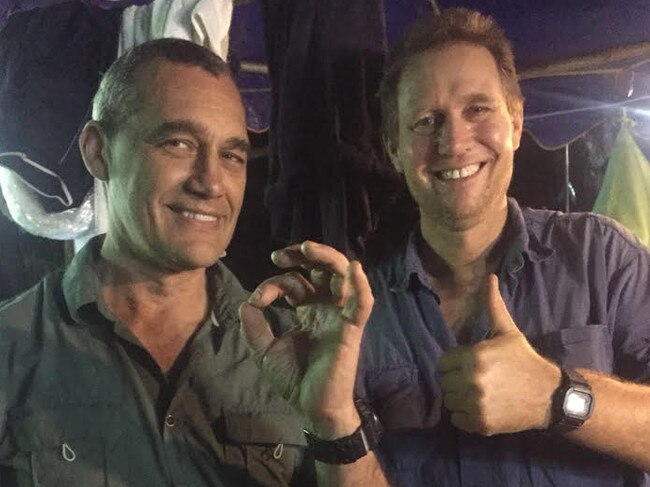 Dr. Richard Harris (right) and his dive partner Craig Challen, taken after they completed the mission. Picture: OFFICE OF THE MINISTER FOR FOREIGN AFFAIRS