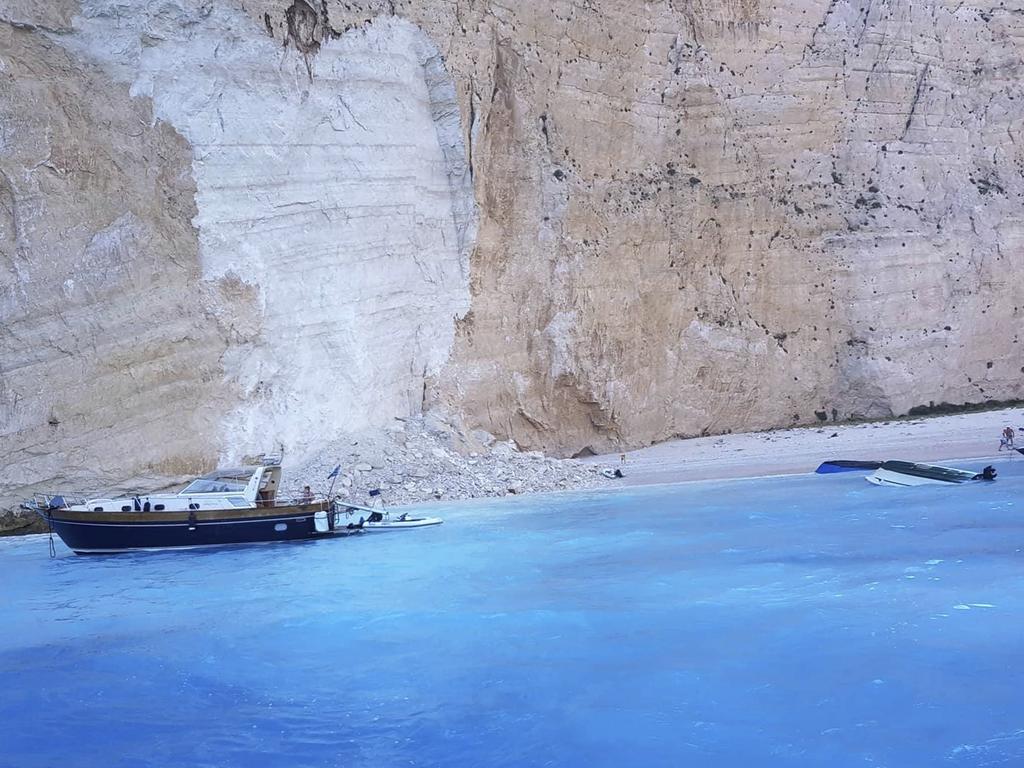 Small boats are capsized after a landslide. Picture: imerazante.gr via AP