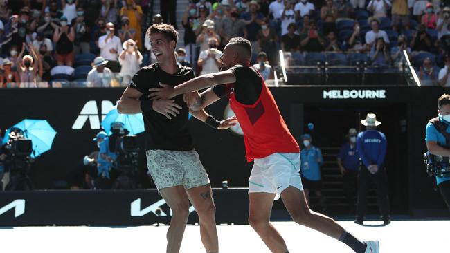 Australia's Thanasi Kokkinakis and Nick Kyrgios react after winning through to the men’s doubles final. Picture: BRANDON MALONE/AFP