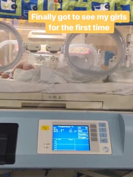 Eddie Betts meets his twin daughters for the first time. Picture: Instagram