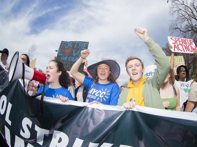 Bryher Mckewin (with mic) , Amelie Hudspeth and Toby Thorpe. Climate strike rally in Hobart. Picture: RICHARD JUPE