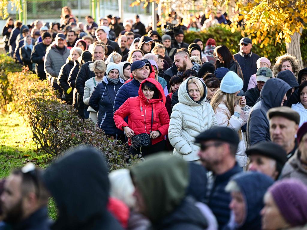 Moldovans in the region of Transnistria region wait in line to vote. Picture: AFP