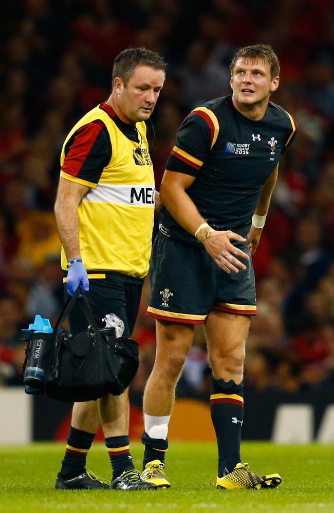 Dan Biggar (R) leaves the pitch following an injury during Wales’ win over Fiji at Millennium Stadium, Cardiff.