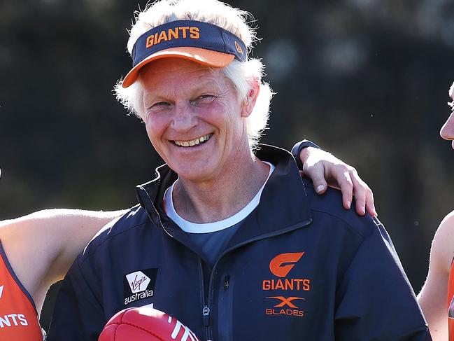 New AFLW coach for the GWS Giants women's team Alan McConnell with players Renee Forth, Maddy Collier and Emma Swanson. MCConnell has been an assistant with the men's AFL side. Picture. Phil Hillyard