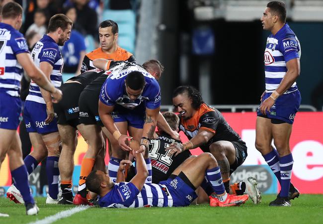 Chris Lawrence scores a crucial try. Picture: Brett Costello