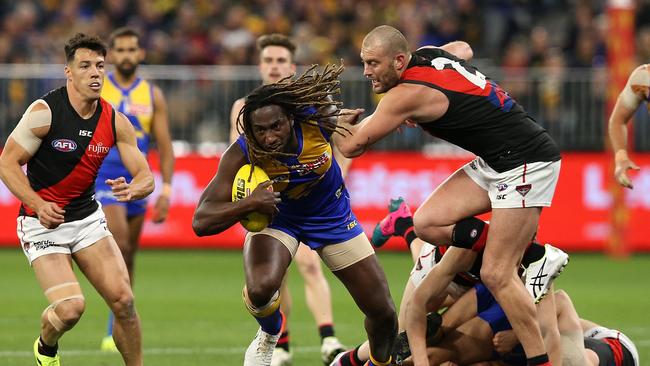 Nic Naitanui breaks clear of Tom Bellchambers. Picture: Getty Images