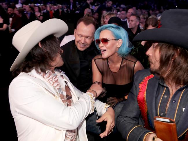 Jess Carson, Donnie Wahlberg, Jenny McCarthy and Mark Wystrach attend the 60th Annual GRAMMY Awards at Madison Square Garden on January 28, 2018 in New York City. Picture: Getty