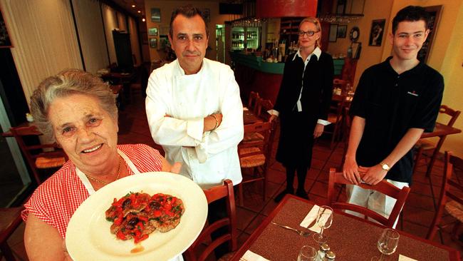 A photo taken at Gold Coast’s Nicolinis Ristorante and Bar in 1999. Mario and Merridy Alfieri are pictured in centre, with Christian Alfieri on the right.