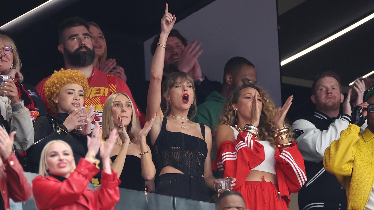 Taylor Swift and actress Blake Lively on the balcony of their suite at the Super Bowl 2024 in Las Vegas. Picture: EZRA SHAW / GETTY IMAGES NORTH AMERICA / Getty Images via AFP