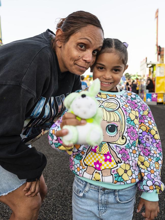 Sharaya Close with daughter Jahlaya Leisha in sideshow alley at the Toowoomba Royal Show, Thursday, March 30, 2023. Picture: Kevin Farmer