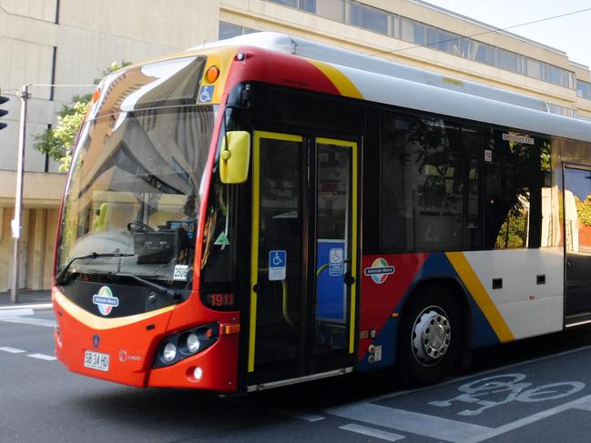 An Adelaide metro bus is seen driving down Angas Street in Adelaide, Monday, April 2, 2018. (AAP Image/Morgan Sette) NO ARCHIVING