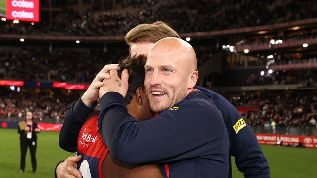 Perth - September 10 2021: AFL Preliminary Final . Melbourne vs Geelong at Optus Stadium, Perth. Nathan Jones hugs Kysaiah Pickett after tonights win over Geelong . Photo by Michael Klein