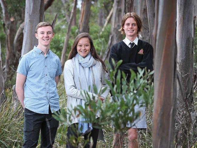 Toby with Melati Wijsen and Angus McIntosh during the 2019 Tasmanian Youth Climate Leaders conference.Picture: LUKE BOWDEN