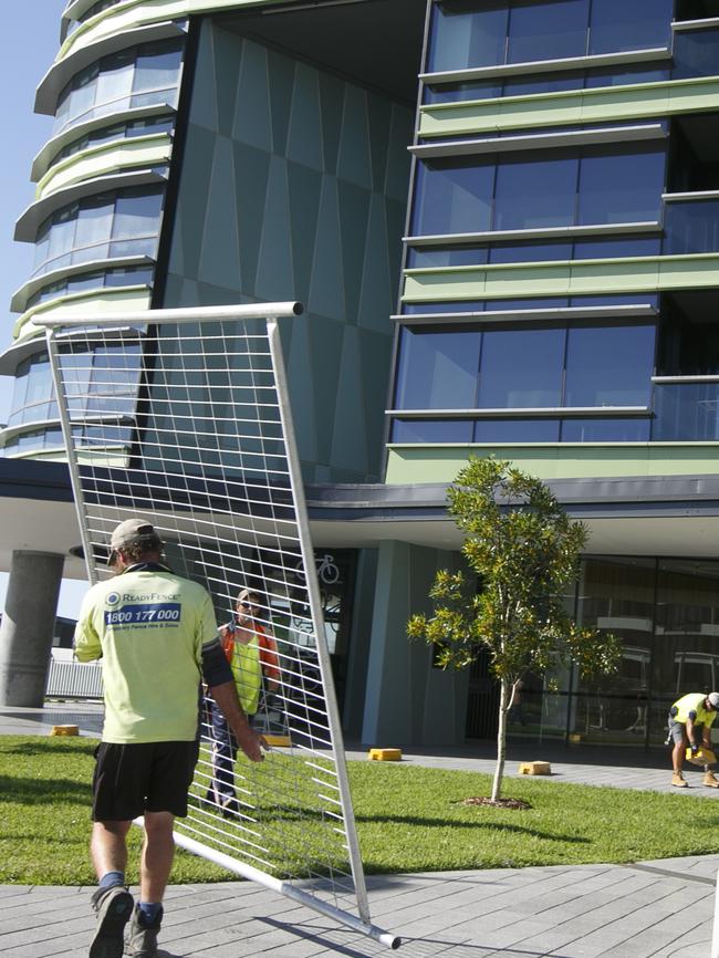 Workers at the Opal Tower. Picture: Tim Pascoe