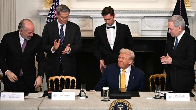 Howard Lutnick, left, with Donald Trump at the White House. Picture: Jim Watson/AFP