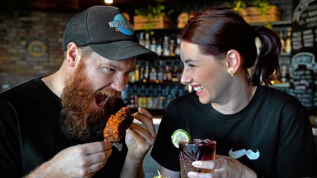 BIG MEATS: Ben Baker and Hazel Burns, owners of Dirty Moe's bar, Mooloolaba. Picture: Patrick Woods