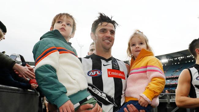 Scott Pendlebury’s family and friends, including his two children, will be on hand to help him celebrate his 350th game in Adelaide. Picture: Getty Images