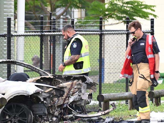 A Tesla driver and his teenage passenger have been injured after the car slammed into a pole and caught fire in Brisbane's north.Saturday November 30, 2024. Picture, John Gass