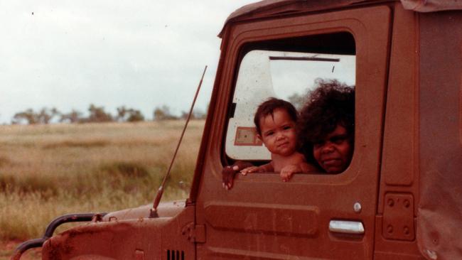 A young Jacinta Price with her mother Bess on their way to Noonkanbah, WA, in her father's Daihatsu. Picture: Supplied/ Jacinta Nampijinpa Price