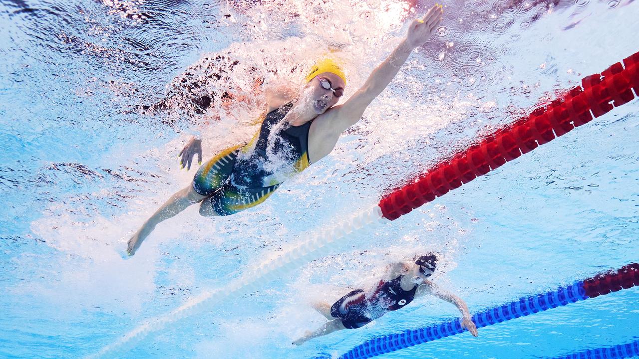 Captured using an underwater robotic camera, Ariarne Titmus of Team Australia and Summer McIntosh of Team Canada slug it out in the women's 400m freestyle final on day one. Titmus controlled the race and won the gold for Australia, with McIntosh second and USA legend Katie Ledecky third. Picture: Adam Pretty/Getty Images