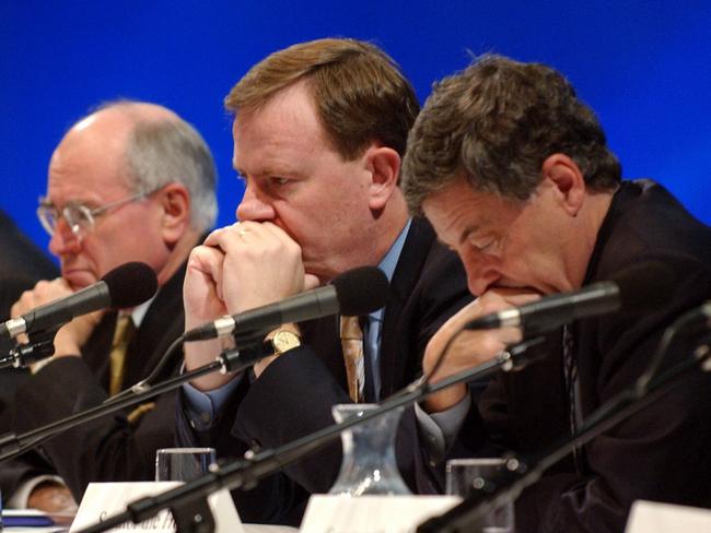 Aust politician Prime Minister John Howard (l) with Peter Costello (c) and Senator Robert Hill at the Liberal Party National Convention in Adelaide 06 Jun 2003.