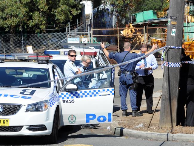 Police outside 'A Team Bodyworks' after Charbaji’s shooting.