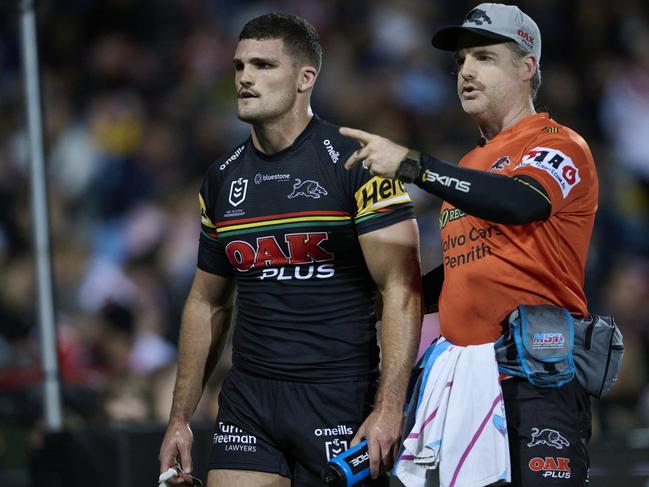 PENRITH, AUSTRALIA - JUNE 04: Nathan Cleary of the Panthers is assisted from the field with an injury during the round 14 NRL match between Penrith Panthers and St George Illawarra Dragons at BlueBet Stadium on June 04, 2023 in Penrith, Australia. (Photo by Brett Hemmings/Getty Images)