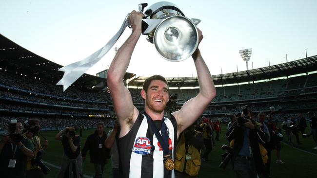 Tyson Goldsack with the 2010 premiership cup.