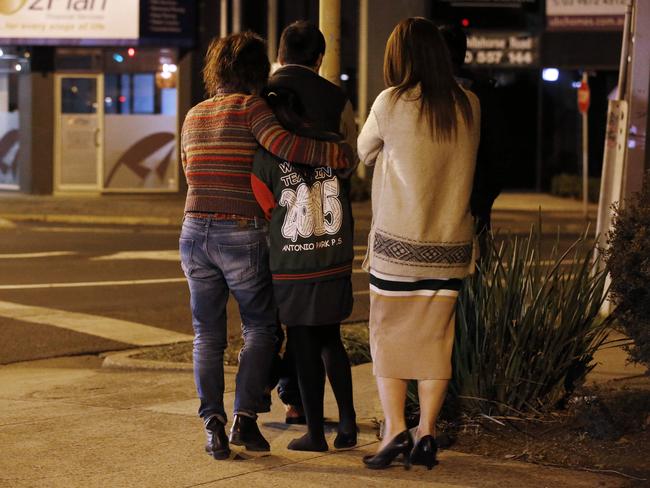 Aivy’s family leave the scene of the accident. Picture: David Caird