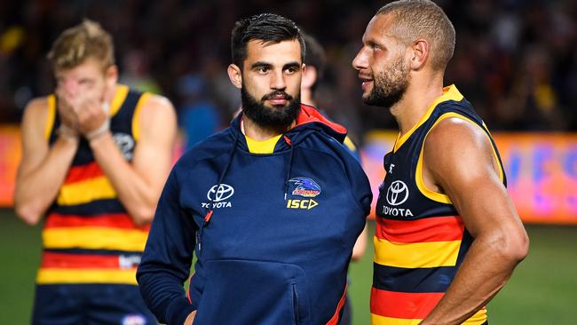 Wayne Milera (left) injured his shoulder in Adelaide’s commanding win over Gold Coast. Picture: Daniel Kalisz/Getty Images.