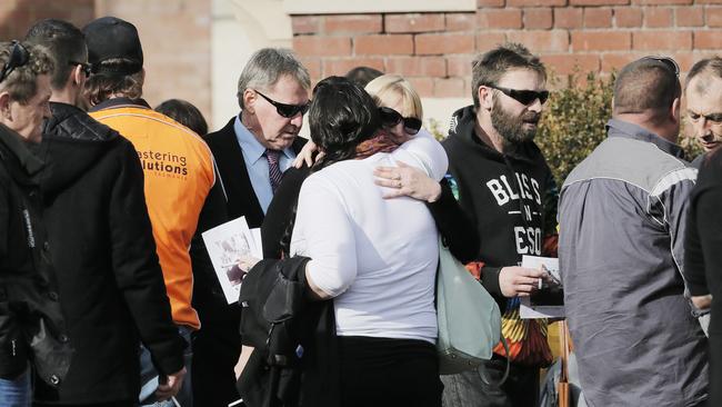 Friends and family of Vanessa Hayward outside the funeral chapel in North Hobart. Picture: MATHEW FARRELL