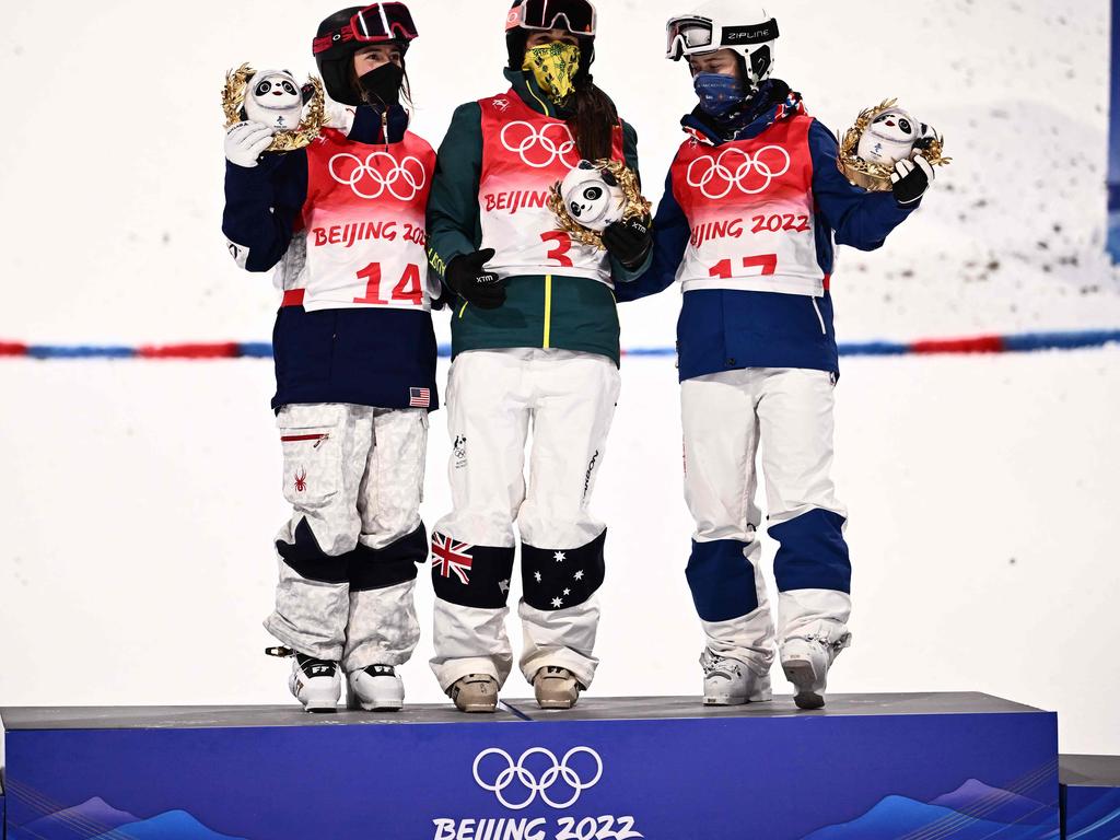 )L to R) Silver medallist USA's Jaelin Kauf, gold medallist Australia's Jakara Anthony and bronze medallist Russia's Anastasiia Smirnova on the podium after the freestyle skiing women's moguls final. Picture: AFP