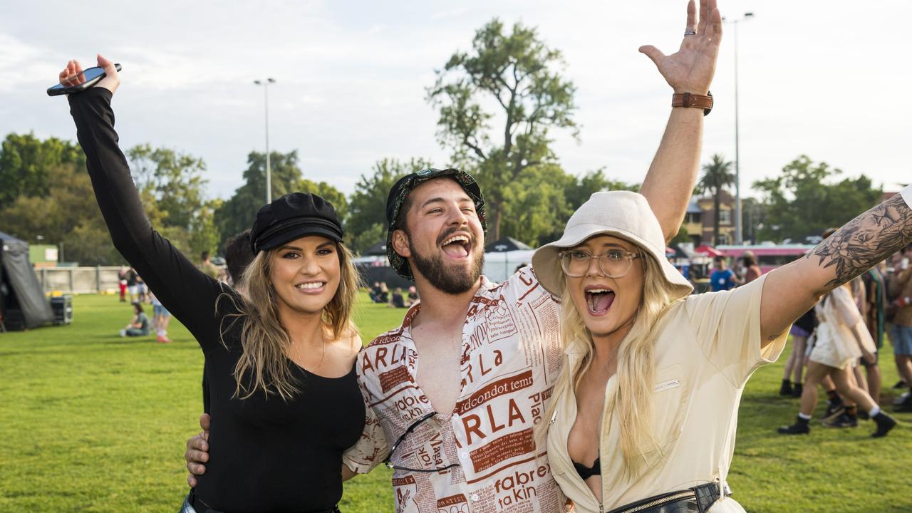 Brayden Joseph with Frankie Reid (left) and Liane Gerrie-Williams at The Backyard Series in Queens Park, Saturday, November 6, 2021. Picture: Kevin Farmer