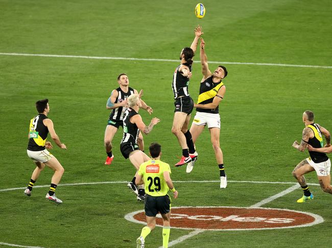 MELBOURNE, AUSTRALIA - JUNE 11: Ivan Soldo of the Tigers and Brodie Grundy of the Magpies compete for the ball during the round 2 AFL match between the Collingwood Magpies and the Richmond Tigers at Melbourne Cricket Ground on June 11, 2020 in Melbourne, Australia. (Photo by Robert Cianflone/Getty Images)