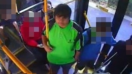 Screen grab from CCTV footage shows Perth schoolboy Cassius Turvey, 15 (bright green shirt) with friends aboard a bus in the moments before he was attacked and killed. Picture: Supplied