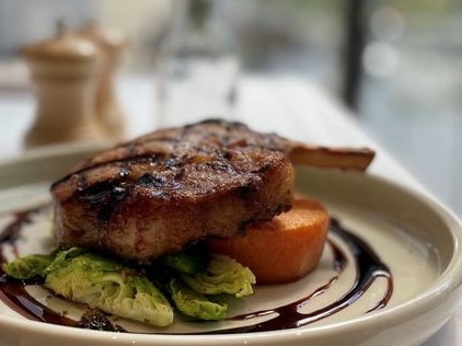 Pork cutlet at Verandah dining, at the Strathmore Hotel, Adelaide. Picture Supplied