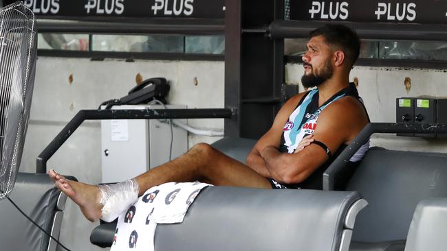 Paddy Ryder on the bench with his Achilles iced. Picture: Sarah Reed