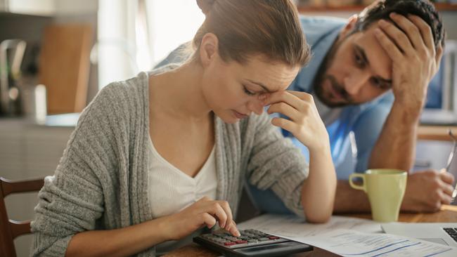 Photo of a couple going through  financials problems