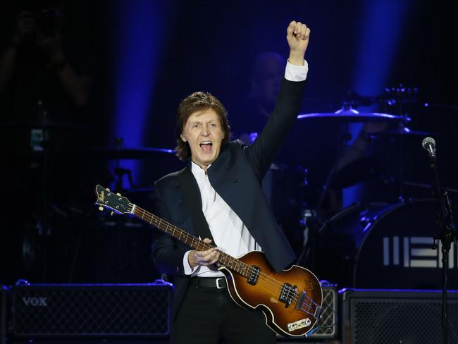 (FILES) This file photo taken on June 11, 2015 shows British musician and former Beatles' member Paul McCartney performs at the Stade de France in Saint-Denis near Paris. The Rolling Stones, Bob Dylan, Paul McCartney, Neil Young, Roger Waters and The Who will perform at a mega festival in October, organizers said May 3, 2016. The iconic artists have been confirmed for the October 7-9 concert at the Empire Polo field in Indio, in the California desert, an event being billed by music lovers as one of the greatest concerts ever. That same venue hosts the annual Coachella music festival. / AFP PHOTO / PATRICK KOVARIK