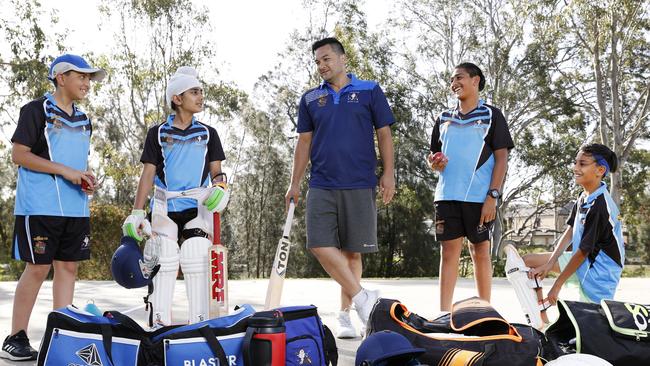 Coach Ryan Hutton with Kellyville Ridge Cricket Club under-12s (from left) Hamza Badyari, 11, Simrat Maan, 10, Dev Patel, 12, and Om Patel, 10. Picture: Jonathan Ng