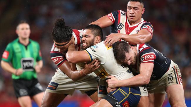 Parramatta’s Isaiah Papali’i charges through a tackle. Picture: NRL Photos