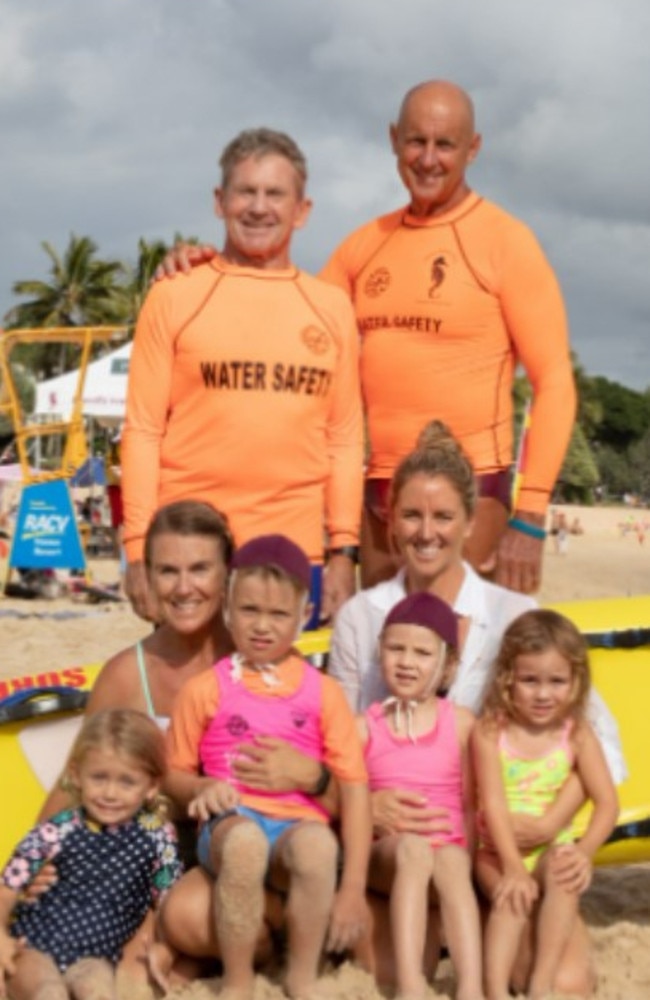 L-R Three generations – Club President/Life Governor Ross Fisher and Life Member Peter French with their daughters and grandchildren. Photo: Noosa Heads Surf Life Saving Club