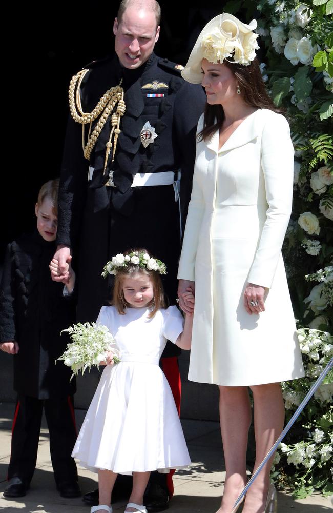 ‘Kate takes a moment to reflect on no longer being the number one Princess on everyone’s lips. She looks sweet and I applaud her for being mainly invisible through the coverage and letting Megsy have the limelight.’ Picture: Andrew Matthews/AFP Photo