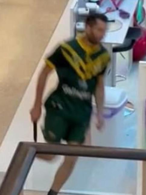 The knifeman runs through the centre, in search of more victims. Picture: Twitter the knifeman running through Bondi Junction Westfield. Twitter