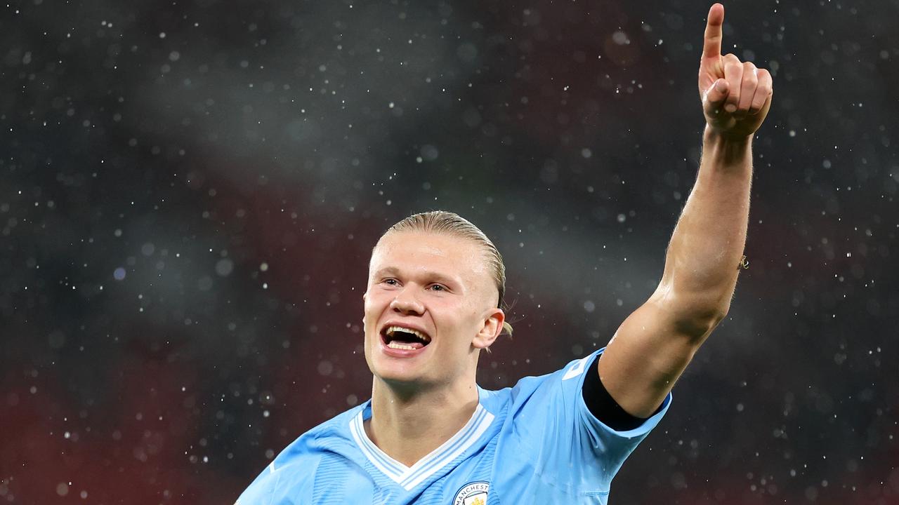 MANCHESTER, ENGLAND – OCTOBER 29: Erling Haaland of Manchester City celebrates after the team's victory in the Premier League match between Manchester United and Manchester City at Old Trafford on October 29, 2023 in Manchester, England. (Photo by Catherine Ivill/Getty Images)