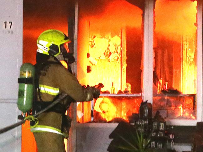 Police have established a crime scene at a house on Pinnacle Street, Sadlier after fire ripped through a single storey home. A mother and two children were sleeping at the time the fire erupted. It is believed at least two molotov cocktails were thrown at the house. One of the bottles was seen outside the front window on the front lawn. Fire crews struggled to extinguish the flames due to the accelerant. Pics Bill Hearne