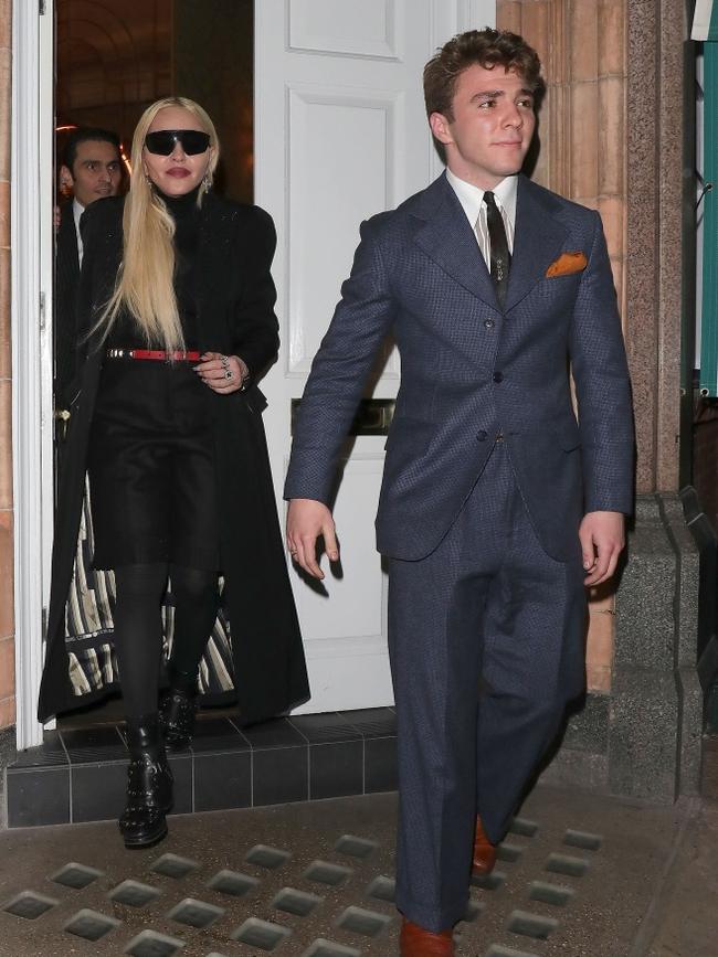 Rocco Ritchie and Madonna left just after midnight. Picture: BackGrid