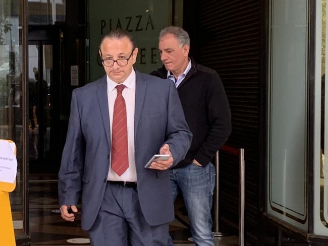 Louie Hawach (right) and his lawyer (left) leaving Downing Centre Court on Monday. Picture: Supplied