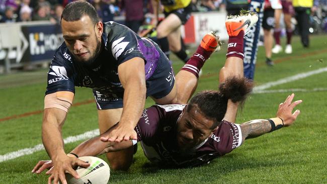 Will Chambers jumps over Jorge Taufua to score a crucial try. Picture: Hamish Blair