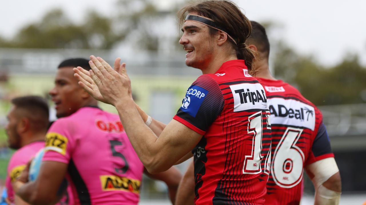 Cody Ramsey of the Dragons celebrates his winning try